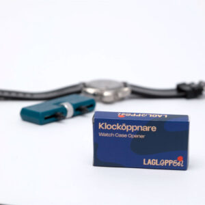 Kellon takakannen avaaja - Pariston vaihtamista varten