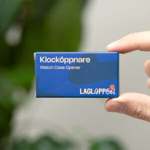 Kellon takakannen avaaja - Pariston vaihtamista varten
