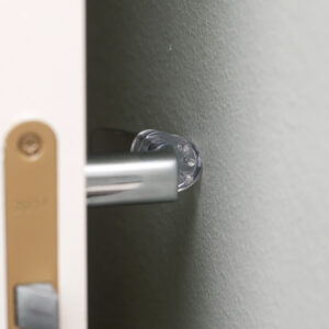 Ovenpysäytin ovenkahvaan