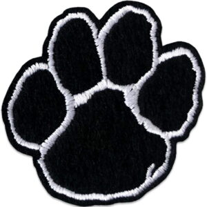 Tygmärke föreställande svart hundtass