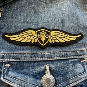 tygmärke militär vinge jacka