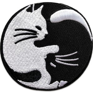 Kissasisarukset - Kangasmerkki